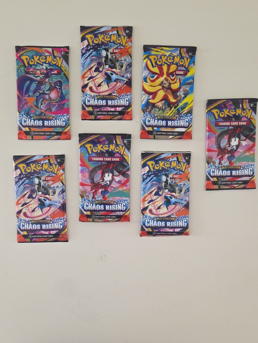 Pokémon Mega Evolution Chaos Rising Packs English, 7 Packs